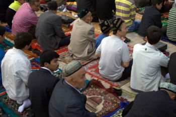 Uyghurs at a mosque in Kashgar Xinjiang China Uyghurs at a mosque in Kashgar Xinjiang China