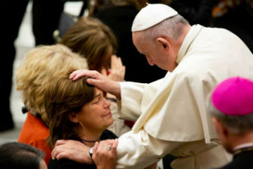 Pope Francis blesses woman Image of Pope Francis blesses woman