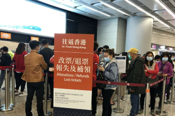 Hong Kong residents queuing to refund their bullet train tickets to the mainland in West Kowloon railway station bc coronavirus Jan 25 2020 Image of Hong Kong residents queuing to refund their bullet train tickets to the mainland in West Kowloon railway station bc coronavirus Jan 25 2020