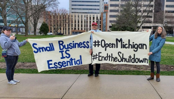 Protesters call for the reopening of business amid lockdown orders. Image of Protesters call for the reopening of business amid lockdown orders.