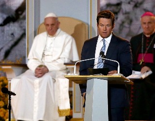 Mark Wahlberg giving a speech during Pope Francis' 2015 visit to the United States. Image of Mark Wahlberg giving a speech during Pope Francis' 2015 visit to the United States.