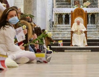 Children met with Pope Francis at the Church of the Immaculate Conception in Qaraqosh, Iraq. Image of Children met with Pope Francis at the Church of the Immaculate Conception in Qaraqosh, Iraq.