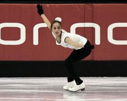 U.S. FIGURE SKATER PERFORMS – Kimmie Meissner performs during the women's long program at the U.S. figure skating championships in St. Louis Jan. 14. The 16-year-old skater from the Archdiocese of Baltimore is a competitor in the XX Winter Olympic Games in Turin, Italy. (CNS photo/Reuters)
Image of U.S. FIGURE SKATER PERFORMS – Kimmie Meissner performs during the women's long program at the U.S. figure skating championships in St. Louis Jan. 14. The 16-year-old skater from the Archdiocese of Baltimore is a competitor in the XX Winter Olympic Games in Turin, Italy. (CNS photo/Reuters)