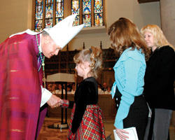 BISHOP CONGRATULATES CATECHUMEN – Greensburg Bishop Lawrence E. Brandt shakes hands with catechumen Tabitha Morris, 7, March 5 at Blessed Sacrament Cathedral in Greensburg, Pa. Behind her is her sister Summer, 12, also a catechumen, and their sponsor Madeline Weigner. (The Catholic Accent photo)
Image of BISHOP CONGRATULATES CATECHUMEN – Greensburg Bishop Lawrence E. Brandt shakes hands with catechumen Tabitha Morris, 7, March 5 at Blessed Sacrament Cathedral in Greensburg, Pa. Behind her is her sister Summer, 12, also a catechumen, and their sponsor Madeline Weigner. (The Catholic Accent photo)
