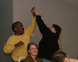 Two Pittsburgh Steelers fans celebrate during a Super Bowl party earlier this year that was hosted by the Northwest Arkansas Catholic Singles. (Arkansas Catholic photo) Image of Two Pittsburgh Steelers fans celebrate during a Super Bowl party earlier this year that was hosted by the Northwest Arkansas Catholic Singles. (Arkansas Catholic photo)