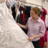 Samantha Mosher, prevention educator at the Sexual Assault Service Center of Guardian Angel Community Services, sifts through donated gowns at the center in Joliet, Ill, in early April. Nearly 40 girls attended a safety course on dating and then received a free prom dress, shoes, jewelry and other accessories gathered in a drive organized by Mosher for the first time this year. (CNS photo) Image of Samantha Mosher, prevention educator at the Sexual Assault Service Center of Guardian Angel Community Services, sifts through donated gowns at the center in Joliet, Ill, in early April. Nearly 40 girls attended a safety course on dating and then received a free prom dress, shoes, jewelry and other accessories gathered in a drive organized by Mosher for the first time this year. (CNS photo)