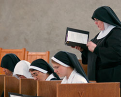 POSTULANT TALKS WITH BENEDICTINE NUN AT COLORADO ABBEY
Postulant Angela Read, right, talks with Benedictine Sister Maria-Walburga Schortemeyer about fixing a tractor at the Abbey of St. Walburga in Virginia Dale, Colo. The Benedictine sisters wear a wimple and veil while working and don a complete religious habit for prayer. (CNS/Wyoming Catholic Register)
Image of POSTULANT TALKS WITH BENEDICTINE NUN AT COLORADO ABBEY
Postulant Angela Read, right, talks with Benedictine Sister Maria-Walburga Schortemeyer about fixing a tractor at the Abbey of St. Walburga in Virginia Dale, Colo. The Benedictine sisters wear a wimple and veil while working and don a complete religious habit for prayer. (CNS/Wyoming Catholic Register)