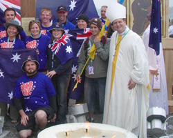 BISHOP WITH YOUTH DAY PILGRIMS - Auxiliary Bishop Anthony C. Fisher of Sydney, right, coordinator of World Youth Day 2008, which will take place July 15-20, is pictured with Australian pilgrims at World Youth Day in Cologne, Germany, last year. Bishop Fisher said the first International World Youth Day ever held in Australia will provide an opportunity for young people to learn about and strengthen their faith and to spread that faith to those Image of BISHOP WITH YOUTH DAY PILGRIMS - Auxiliary Bishop Anthony C. Fisher of Sydney, right, coordinator of World Youth Day 2008, which will take place July 15-20, is pictured with Australian pilgrims at World Youth Day in Cologne, Germany, last year. Bishop Fisher said the first International World Youth Day ever held in Australia will provide an opportunity for young people to learn about and strengthen their faith and to spread that faith to those