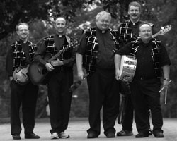 MEMBERS OF KANSAS CITY PRIEST BAND - Members of the Priest Band are, from left, Father Kent O'Connor, Father Mark Mertes, Father Ken Kelly, Father John Reynolds and Carl Parry. The four priests of the Archdiocese of Kansas City, Kan., and Parry, a layman who is studying for the permanent d iaconate, have been putting in a lot of hours lately, rehearsing for their next gig. (CNS/The Leaven) Image of MEMBERS OF KANSAS CITY PRIEST BAND - Members of the Priest Band are, from left, Father Kent O'Connor, Father Mark Mertes, Father Ken Kelly, Father John Reynolds and Carl Parry. The four priests of the Archdiocese of Kansas City, Kan., and Parry, a layman who is studying for the permanent d iaconate, have been putting in a lot of hours lately, rehearsing for their next gig. (CNS/The Leaven)