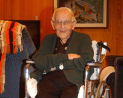 105-YEAR-OLD PRIEST IN RETIREMENT CENTER – Benedictine Father Angelo Zankl, a 105-year-old resident of St. John's Abbey Retirement Center in Collegeville, Minn., sits inside the facility in late July. Father Zankl has seen many changes in his 105 years, but says Image of 105-YEAR-OLD PRIEST IN RETIREMENT CENTER – Benedictine Father Angelo Zankl, a 105-year-old resident of St. John's Abbey Retirement Center in Collegeville, Minn., sits inside the facility in late July. Father Zankl has seen many changes in his 105 years, but says