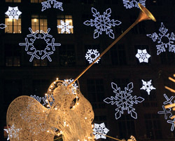 ANGELS ON NEW YORK CITY’S FIFTH AVENUE – Lighted herald angels are seen in front of snowflakes projected on the front of Saks Fifth Avenue in New York Nov. 30. The angels have been part of the Rockefeller Center's annual Christmas display for 20 years. (CNS)
Image of ANGELS ON NEW YORK CITY’S FIFTH AVENUE – Lighted herald angels are seen in front of snowflakes projected on the front of Saks Fifth Avenue in New York Nov. 30. The angels have been part of the Rockefeller Center's annual Christmas display for 20 years. (CNS)