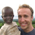 ACTIVIST PICTURED WITH KENYAN BOY - Craig Kielburger, the longtime youth activist who has worked to improve conditions for young people around the world, poses with a Kenyan boy in 2006. (CNS Photo) Image of ACTIVIST PICTURED WITH KENYAN BOY - Craig Kielburger, the longtime youth activist who has worked to improve conditions for young people around the world, poses with a Kenyan boy in 2006. (CNS Photo)
