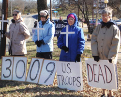WEEKLY WITNESS FOR PEACE - Sisters Madeline Clifton, Rosalie Ruesewald, Ann Michele Raley and Elise Forst demonstrate against the war in Iraq at Creekmore Park in January. Image of WEEKLY WITNESS FOR PEACE - Sisters Madeline Clifton, Rosalie Ruesewald, Ann Michele Raley and Elise Forst demonstrate against the war in Iraq at Creekmore Park in January.