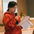 Kasey Fitzpatrick and Kaitlyn Dedman, sixth-grade students at St. Ann School in Nashville, Tenn., report on a service project they conducted as part of a class Kindness Challenge in late January. St. Ann teacher Meghann Robinson gave each of her students $10 and charged them to use the money to help someone. Kaitlyn and Kasey collected donations for the YWCA Domestic Violence Center. The project was inspired by Oprah Winfrey, who recently gave members of her audience $1,000 and told them to do something good with it. (CNS photo/Andy Telli, Tennessee Register) Image of Kasey Fitzpatrick and Kaitlyn Dedman, sixth-grade students at St. Ann School in Nashville, Tenn., report on a service project they conducted as part of a class Kindness Challenge in late January. St. Ann teacher Meghann Robinson gave each of her students $10 and charged them to use the money to help someone. Kaitlyn and Kasey collected donations for the YWCA Domestic Violence Center. The project was inspired by Oprah Winfrey, who recently gave members of her audience $1,000 and told them to do something good with it. (CNS photo/Andy Telli, Tennessee Register)