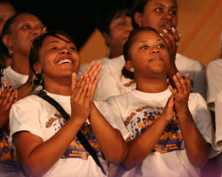 GOSPEL RHYTHMS – Members of Val and Love Alive Fellowship and the Dimensions of Faith choirs, keep time with the music in the Gospel Tent on April 29 at the 38th annual New Orleans Jazz and Heritage Festival in New Orleans, La. (Photo/Mary Carty)
Image of GOSPEL RHYTHMS – Members of Val and Love Alive Fellowship and the Dimensions of Faith choirs, keep time with the music in the Gospel Tent on April 29 at the 38th annual New Orleans Jazz and Heritage Festival in New Orleans, La. (Photo/Mary Carty)
