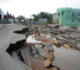 Utility workers repair downed power lines on a flood-damaged road in Villahermosa, Mexico, Nov. 9. Flood evacuees now face the challenge of rebuilding their lives in the face of many obstacles. (CNS photo/Ioan Grillo) (Nov. 12, 2007) Image of Utility workers repair downed power lines on a flood-damaged road in Villahermosa, Mexico, Nov. 9. Flood evacuees now face the challenge of rebuilding their lives in the face of many obstacles. (CNS photo/Ioan Grillo) (Nov. 12, 2007)