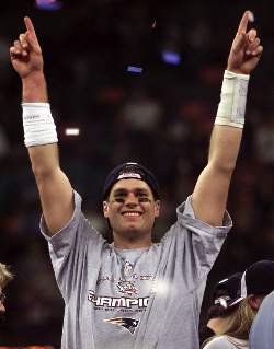 SUPER SON - Tom Brady, quarterback of the NFL's New England Patriots, celebrates after a Super Bowl victory. Brady's namesake father, Tom Brady Sr., is a California businessman and a devout Catholic. Brady Sr., in a speech last spring at the seventh annual Worcester Diocesan Men's Conference in Worcester, Mass., challenged Catholic men to use their faith to deal with life's pressures. (CNS photo/Mike O'Connell, Catholic Free Press) Image of SUPER SON - Tom Brady, quarterback of the NFL's New England Patriots, celebrates after a Super Bowl victory. Brady's namesake father, Tom Brady Sr., is a California businessman and a devout Catholic. Brady Sr., in a speech last spring at the seventh annual Worcester Diocesan Men's Conference in Worcester, Mass., challenged Catholic men to use their faith to deal with life's pressures. (CNS photo/Mike O'Connell, Catholic Free Press)
