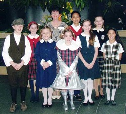 A UNIFORM LOOK - Catholic school uniforms at many schools have changed over the years, but they remain popular with parents as a way to reduce competition among their children and schoolmates over clothing styles and brands. Image of A UNIFORM LOOK - Catholic school uniforms at many schools have changed over the years, but they remain popular with parents as a way to reduce competition among their children and schoolmates over clothing styles and brands.