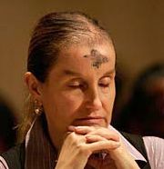 LENTEN ASHES - Bridgette Portelle of Vienna, Va., prays during a Mass at the Basilica of the National Shrine of the Immaculate Conception in Washington on Ash Wednesday, Feb. 6. Ash Wednesday marks the beginning of Lent, the season that calls Christians to prayer, fas ting, repentance and charity. (CNS/Bob Roller)
<br> Image of LENTEN ASHES - Bridgette Portelle of Vienna, Va., prays during a Mass at the Basilica of the National Shrine of the Immaculate Conception in Washington on Ash Wednesday, Feb. 6. Ash Wednesday marks the beginning of Lent, the season that calls Christians to prayer, fas ting, repentance and charity. (CNS/Bob Roller)
<br>