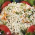 RICE AND EASY - Combine jasmine rice, vegetables, and dressing for a simple salad. Image of RICE AND EASY - Combine jasmine rice, vegetables, and dressing for a simple salad.