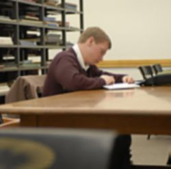 NEW ENVIRONMENT - A former Marine, Brendan Hart studies in the library at Dartmouth College. The school is at the forefront of an effort to guide wounded veterans through the college process. (Joanne Ciccharello) Image of NEW ENVIRONMENT - A former Marine, Brendan Hart studies in the library at Dartmouth College. The school is at the forefront of an effort to guide wounded veterans through the college process. (Joanne Ciccharello)