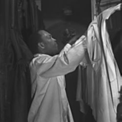 NIGHT TRAIN - A Pullman porter) makes up an upper berth aboard a train bound for Chicago. In the 1920s, the Pullman Company was the largest employer of blacks in the United States. (Library of Congress, Prints & Photographs Division, FSA/OWI Collection) Image of NIGHT TRAIN - A Pullman porter) makes up an upper berth aboard a train bound for Chicago. In the 1920s, the Pullman Company was the largest employer of blacks in the United States. (Library of Congress, Prints & Photographs Division, FSA/OWI Collection)