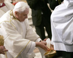 Pope Benedict XVI continues his call to the faithful to allow the deeper meaning of the Eucharist to motivate them to put Love into action by reaching out to feed the hungry and continuing the mission of the Lord through His Church. Image of Pope Benedict XVI continues his call to the faithful to allow the deeper meaning of the Eucharist to motivate them to put Love into action by reaching out to feed the hungry and continuing the mission of the Lord through His Church.