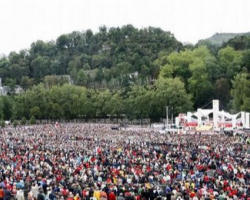 To the Pilgrims gathered at the shrine of Our Lady of Lourdes and to all the Pilgrims throughout the entire world, the Holy Father proclaimed the message of the Cross. Image of To the Pilgrims gathered at the shrine of Our Lady of Lourdes and to all the Pilgrims throughout the entire world, the Holy Father proclaimed the message of the Cross.