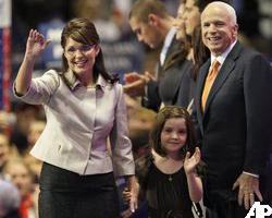 Governor Sarah Palin receiving the congratulatory embrace of the Republican Presidential candidate, Senator John McCain as she accepts his decision to add her to the ticket as the first Republican Female Vice Presidential candidate in American history. Image of Governor Sarah Palin receiving the congratulatory embrace of the Republican Presidential candidate, Senator John McCain as she accepts his decision to add her to the ticket as the first Republican Female Vice Presidential candidate in American history.