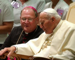 Soon the room was filled with a large smile accompanied by the man who wore it. Archbishop Dolan greeted us as though we were old friends and shared his joy that we were able to come for a visit. Image of Soon the room was filled with a large smile accompanied by the man who wore it. Archbishop Dolan greeted us as though we were old friends and shared his joy that we were able to come for a visit.
