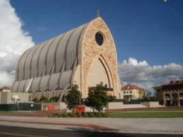 The graduates of Ave Maria University engage in this traditional celebrative act in front of the Oratory on the main Campus in Southwestern Florida. Image of The graduates of Ave Maria University engage in this traditional celebrative act in front of the Oratory on the main Campus in Southwestern Florida.