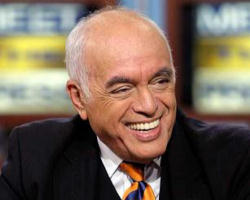 The late Bob Novak being interviewed by the late Tim Russert. Image of The late Bob Novak being interviewed by the late Tim Russert.