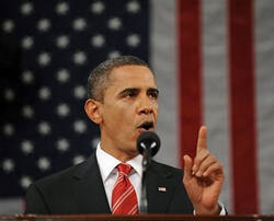 U.S. President Barack Obama pauses as he delivers his first State of the Union address on Capitol Hill in Washington, January 27, 2010. U.S. Vice-President Joe Biden applauds in the rear. Image of U.S. President Barack Obama pauses as he delivers his first State of the Union address on Capitol Hill in Washington, January 27, 2010. U.S. Vice-President Joe Biden applauds in the rear.