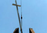 Workers remove the cross from C3 Exchange--formerly Christ Community Church--in Spring Lake, Michigan. Image of Workers remove the cross from C3 Exchange--formerly Christ Community Church--in Spring Lake, Michigan.