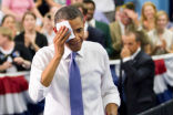Obama wipes the sweat from his brow following his campaigns speech in which he advocated abortion and homosexual equivalency at a high school then invoked the blessings of God. Image of Obama wipes the sweat from his brow following his campaigns speech in which he advocated abortion and homosexual equivalency at a high school then invoked the blessings of God.