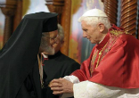 Pope Benedict XVI shakes hands with Lebanon's President Michel Suleiman Image of Pope Benedict XVI shakes hands with Lebanon's President Michel Suleiman