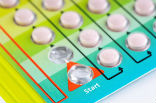 Birth control pills are often colorfully packaged to look like candy. Image of Birth control pills are often colorfully packaged to look like candy.