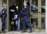 French officials conduct anti-terrorism raids on a routine basis to prevent further acts of violence. Image of French officials conduct anti-terrorism raids on a routine basis to prevent further acts of violence.