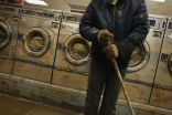 Mud streaks a laundromat from Superstorm Sandy flooding. Many businesses are still trying to clean up as another storm approaches. Image of Mud streaks a laundromat from Superstorm Sandy flooding. Many businesses are still trying to clean up as another storm approaches.