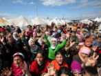 Refugee camps are filled with women and children. The men are either fighting or dead. Image of Refugee camps are filled with women and children. The men are either fighting or dead.