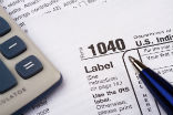 Automatic tax filing would save some headache each April. Image of Automatic tax filing would save some headache each April.