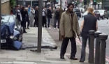 A courageous woman confronts one of the Muslim terrorists. Image of A courageous woman confronts one of the Muslim terrorists.