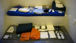 This is the standard issue for Gitmo inmates. Personal items, such as Korans are not pictured here. It costs taxpayers at least $900k per year, to provide this to suspected terrorists. Image of This is the standard issue for Gitmo inmates. Personal items, such as Korans are not pictured here. It costs taxpayers at least $900k per year, to provide this to suspected terrorists.