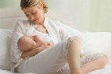 Breastfeeding baby is good for all. Image of Breastfeeding baby is good for all.