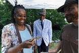 Tracy Jenkins, right, assistant site supervisor, shares an early 20th century toy gun with photographers.
Image of Tracy Jenkins, right, assistant site supervisor, shares an early 20th century toy gun with photographers.