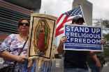 Protesters across the nation are making a new stand for religious freedom and the protection of life. Image of Protesters across the nation are making a new stand for religious freedom and the protection of life.