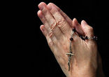 Hands in Prayer with Rosary. Image of Hands in Prayer with Rosary.
