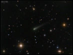 Comet ISON has a yellow-green tint in this image. Image of Comet ISON has a yellow-green tint in this image.