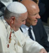 Pope Francis caught a rosary with his ear yesterday. Image of Pope Francis caught a rosary with his ear yesterday.
