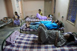 Mothers in a surrogate house. Critics say the system exploits poor women. Image of Mothers in a surrogate house. Critics say the system exploits poor women.